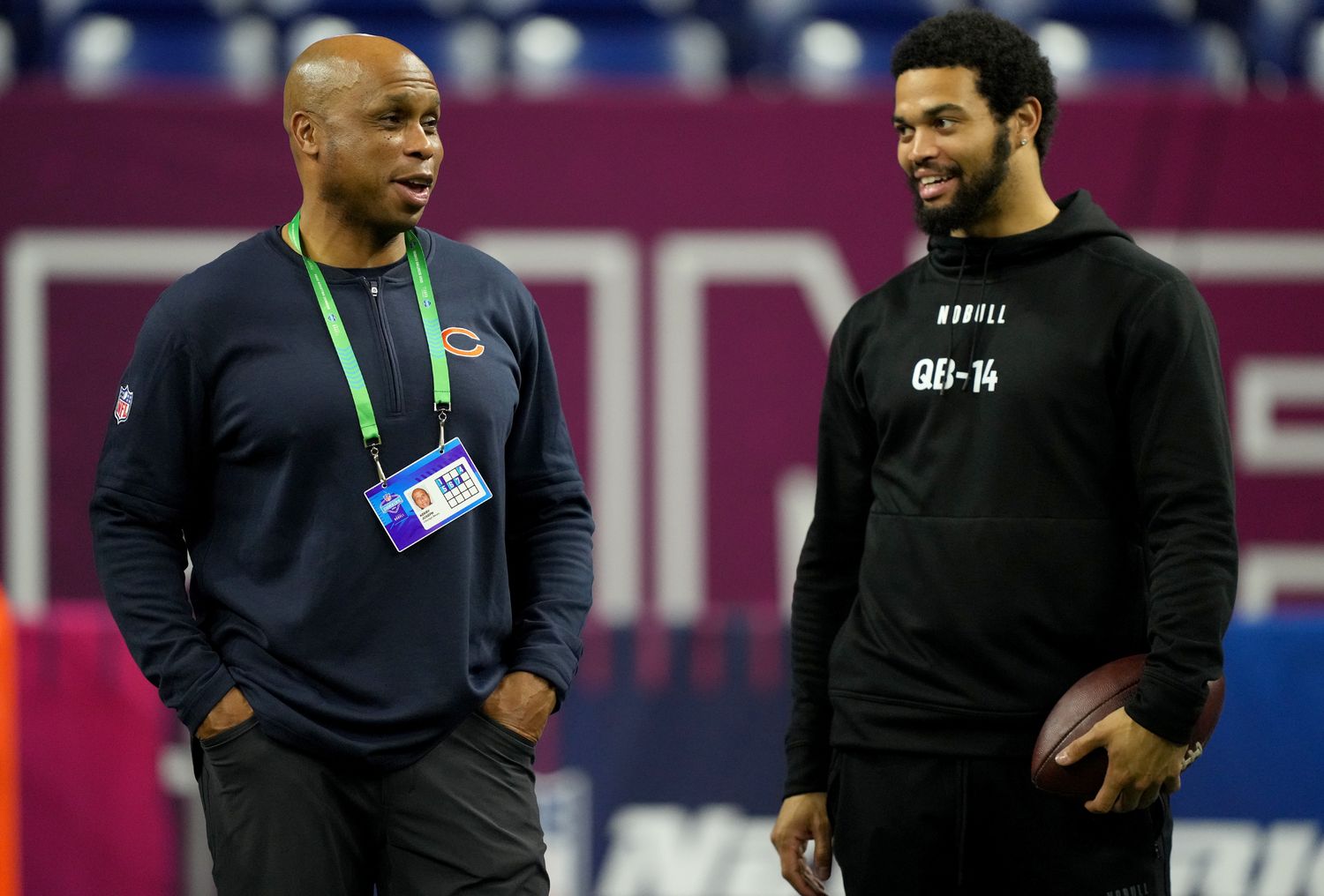 Caleb Williams talks with Bears quarterbacks coach Kerry Joseph at the combine.